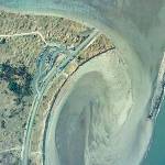 COURTESY ARMY CORPS OF ENGINEERS                                An aerial view taken after the sand spit connecting the South Jetty to the mainland was breached in 1993.