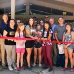 (Courtesy YMCA of Grays Harbor) Camp Bishop attendees cut a ribbon at the new dining hall.