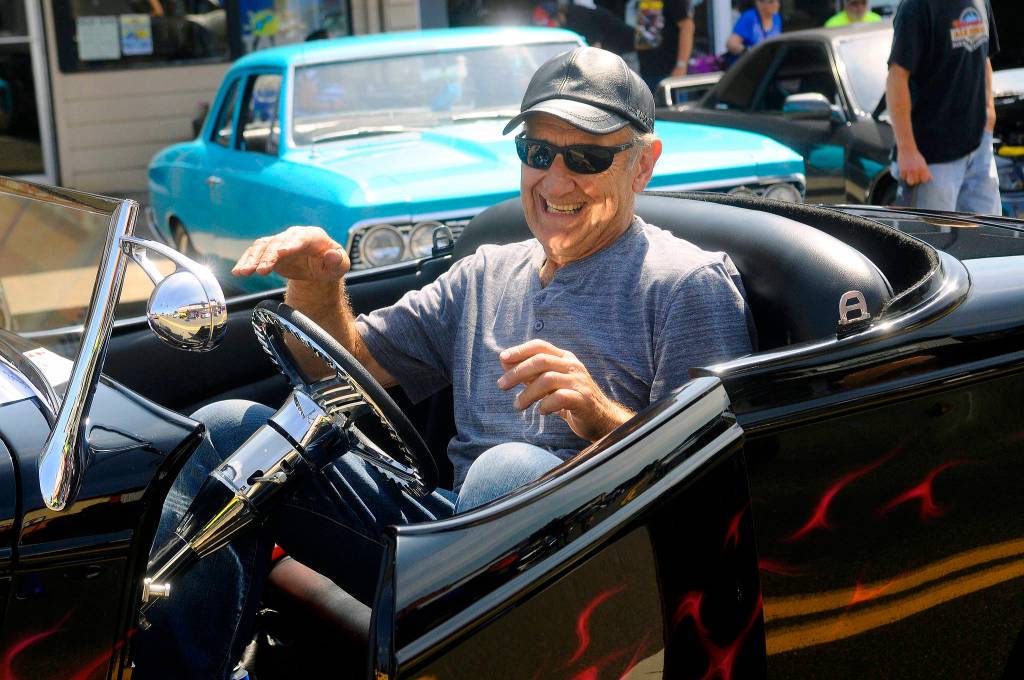 Hasani Grayson | Grays Harbor News Group                                 Jack Williams steps out of his classic car at Heat on the Street on Elma on Saturday.