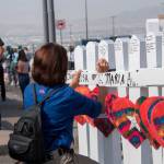 Members of the Crosses for Losses group arrive at the scene with crosses for each victim, after the shooting that left 21 people dead at the Cielo Vista Mall WalMart in El Paso, Texas, on Monday. (Mark Ralston/Getty Images)