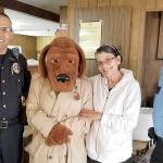 COURTESY ABERDEEN POLICE DEPARTMENT                                There were at least 12 gatherings throughout the Aberdeen area during National Night Out Tuesday, according to the Aberdeen Police Department. Members of the Police Explorer Post escorted McGruff the Crime Dog to various locations, here with Police Chief Steve Shumate at one of the stops.