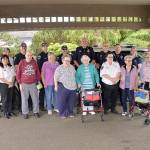 DAN HAMMOCK | GRAYS HARBOR NEWS GROUP                                First stop for the Hoquiam police and fire departments was Channel Point Village during Tuesdays National Night Out celebration. Here firefighters, police and city officials pose for a picture with a few of the retirement communitys residents.