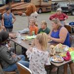 DAN HAMMOCK | GRAYS HARBOR NEWS GROUP                                There were nine official National Night Out block parties in Hoquiam Tuesday evening. Here McGruff the Crime Dog stops by one at the Hoquiam Elks Lodge as families enjoy the hot dogs and other treats provided by the lodge.