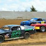 Jason Tole (34), Daryl Brumfield (11) and Rodgery Perry (97) jostle for position during Saturdays action at the Grays Harbor Raceway in Elma. (Photo by AR Racing Videos)
