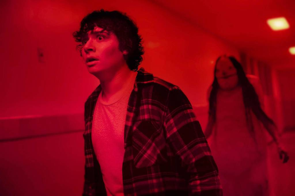 Lionsgate                                Chuck (Austin Zajur) tries to escape the Pale Lady in Scary Stories to Tell in the Dark.