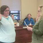 DAN HAMMOCK | GRAYS HARBOR NEWS GROUP                                Beth Reid, left, is sworn in by Hoquiam Mayor Jasmine Dickhoff to fill the vacant Ward 6 City Council position Monday evening.