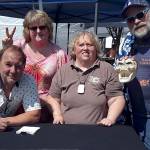 Courtesy photo                                From left, AST board members Jeff Ryser, Ann Lewis, Karen DeMasters and Greg Zschomler goof around at a recent street fair.
