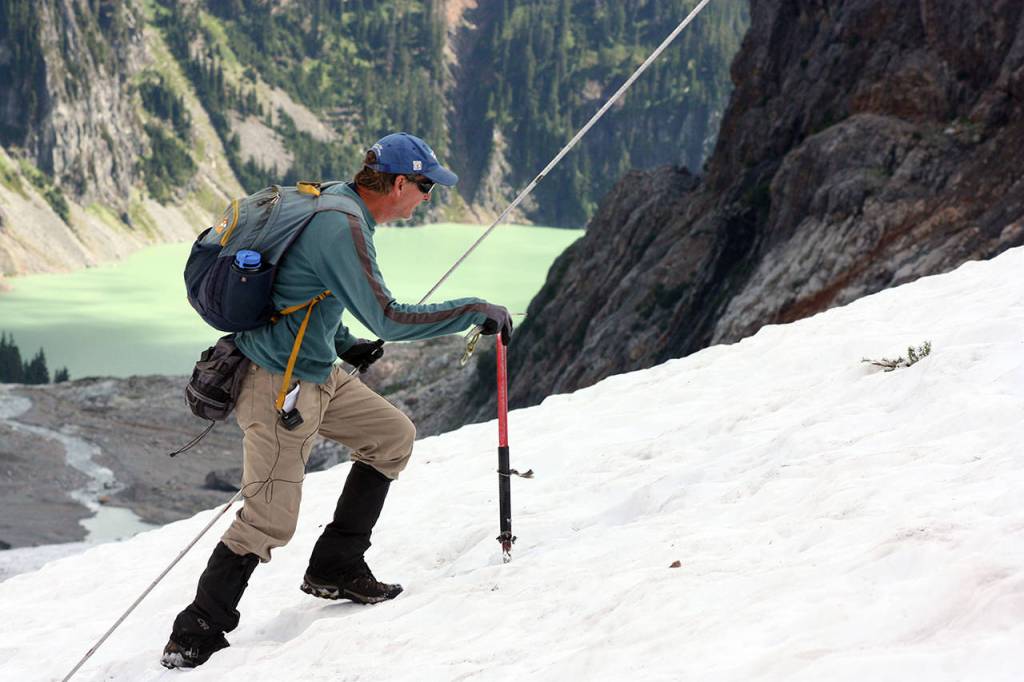 Glaciologist Mauri Pelto and a team of researchers spent Monday afternoon taking snow depth measurements. Much of the snow likely will be gone by summers end. (Zachariah Bryan / The Herald)