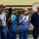 Jack Thompsons wife Trish (holding microphone) speaks at a dedication service for a new maritime mural, along with Jacks son Jack Jr., left, granddaughter Sunny Wheeler, and son Jerry Thompson. The mural was dedicated to Jack Thompson Sr., a former port commissioner who died this past October.