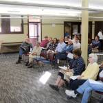 Michael Lang | Grays Harbor News Group                                 Sarah Ogden (left), district manager for innovation and user experience at Timberland Regional Library, calls on a member of the audience during a public meeting Wednesday at the branch in Hoquiam.