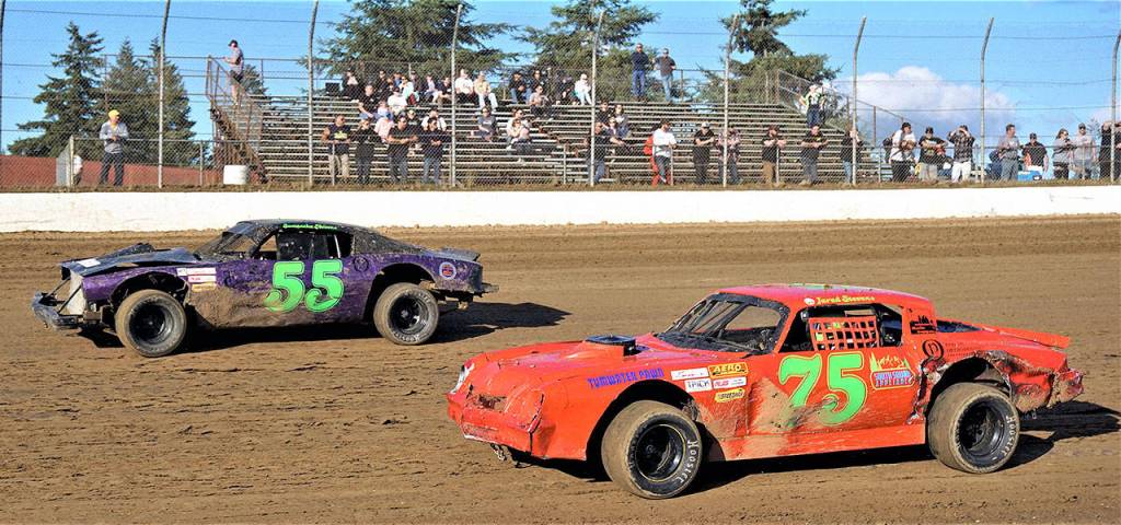 Siblings Samantha Stevens (55) and Jared Stevens race in the Cut Rate Auto Parts Street Stocks class at Grays Harbor Raceway on Saturday in Elma. (Photo by AR Racing Videos)