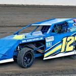 Zach Simpson races his modified car to victory in the feature race of the Shipwreck Beads Modified class on Saturday at Grays Harbor Raceway in Elma. (Photo by AR Racing Videos)