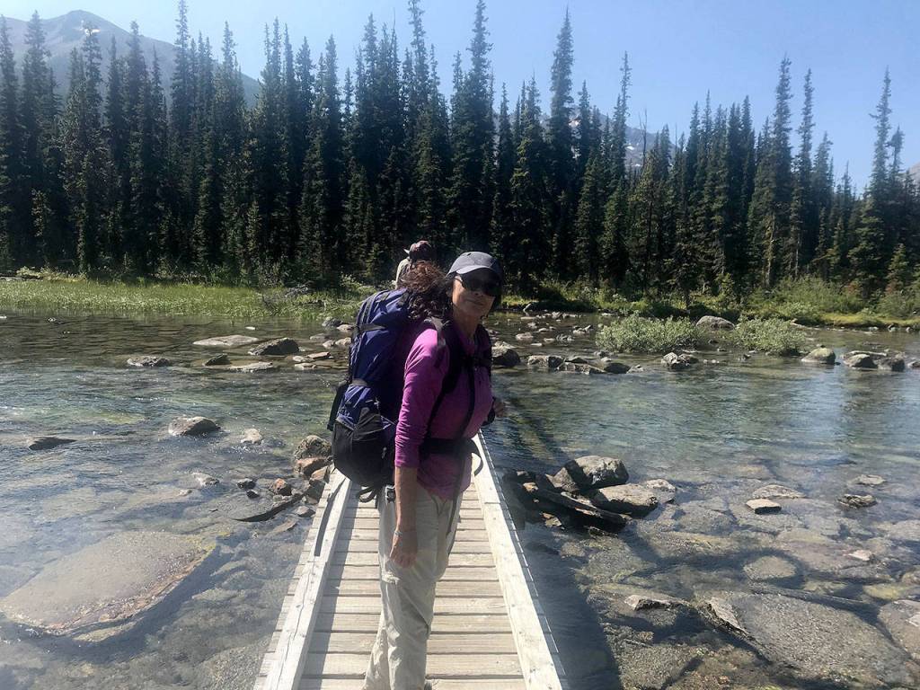 Louis Krauss | Grays Harbor News Group                                The authors mother, Fern Shen, crosses the bridge at Shadow Lake in Banff National Park.