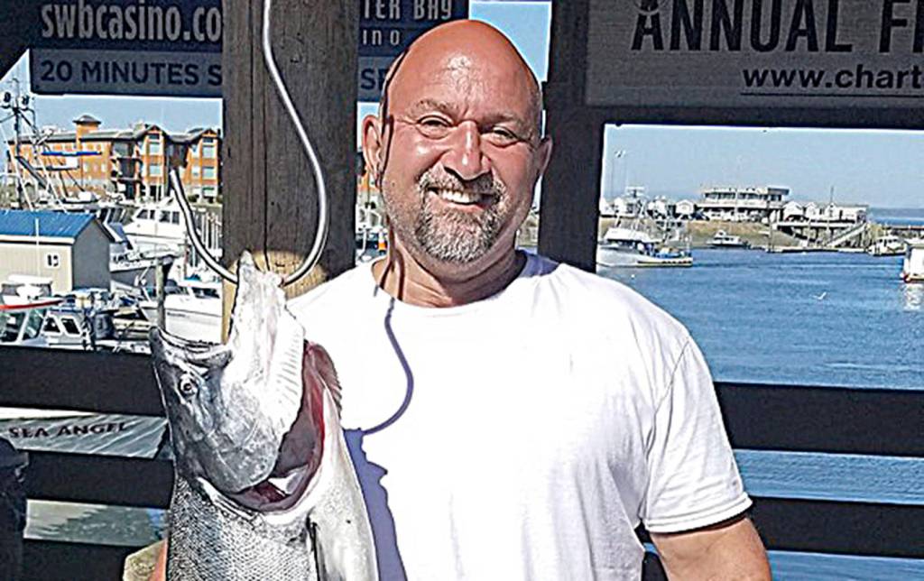 COURTESY WESTPORT WEIGHMASTER                                Nicholas Leverette from Lake Tapps won the Aug. 27 daily Westport Charterboat Association derby with this 19-pound Chinook.