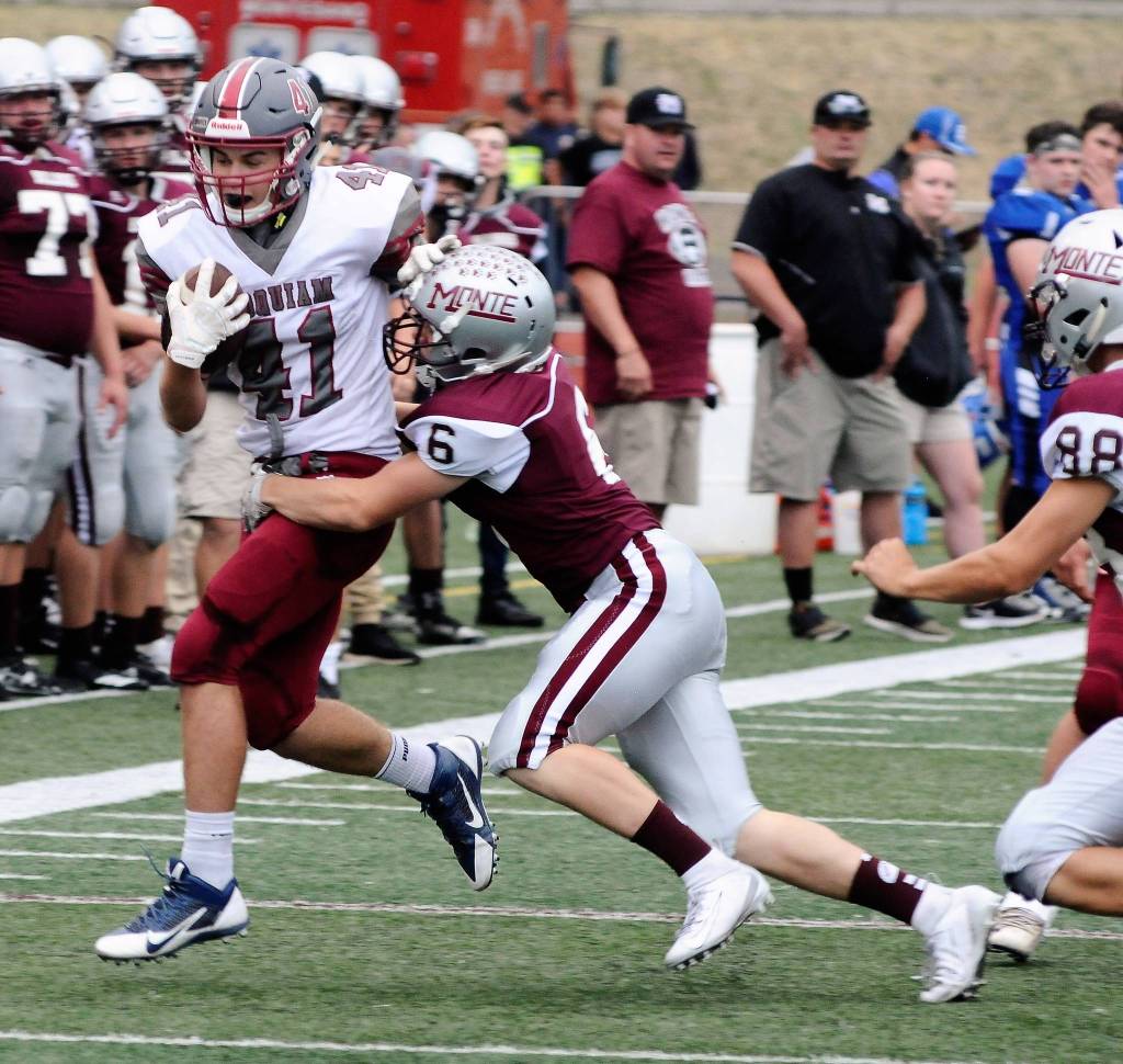 Hoquiams Ben Estes is run out of bounds by Montesanos Hunter Schnoor at the Jamboree in Montesano on Friday.(Hasani Grayson | Grays Harbor News Group)