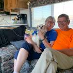 Kat Bryant | Grays Harbor News Group                                Glenn and Charlcie Koster relax in their Pace Arrow RV with Walker on the evening before the final day of Glenns walk. They spent that night in the Walmart parking lot in Aberdeen.