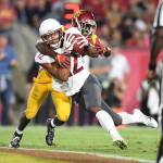 Washington State receiver Dezmon Patmon catches a 7-yard touchdown pass in front of USC cornerback Greg Johnson in the second quarter at the Los Angeles Memorial Coliseum on Friday, Sept. 21, 2018. (Wally Skalij/Los Angeles Times/TNS)