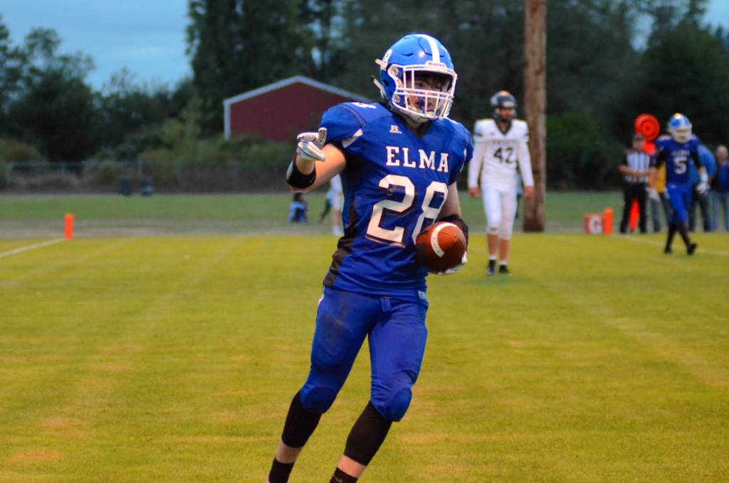 Elmas Isaiah OFarrill scored on a touchdown run in the second quarter against Kings Way Christian on Friday in Elma. (Photo by Sue Michalak Budsberg)