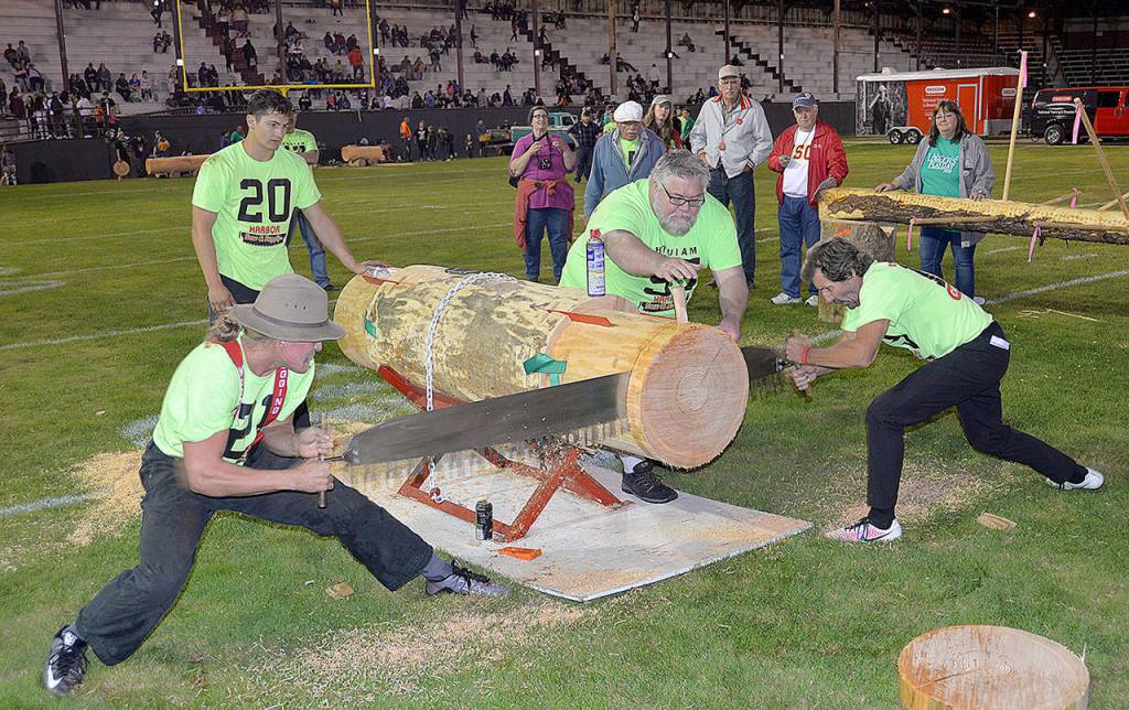 DAN HAMMOCK | GRAYS HARBOR NEWS GROUP                                Tristan Van Beek, left, and Rob Waibel compete in the Open Double Buck competition.