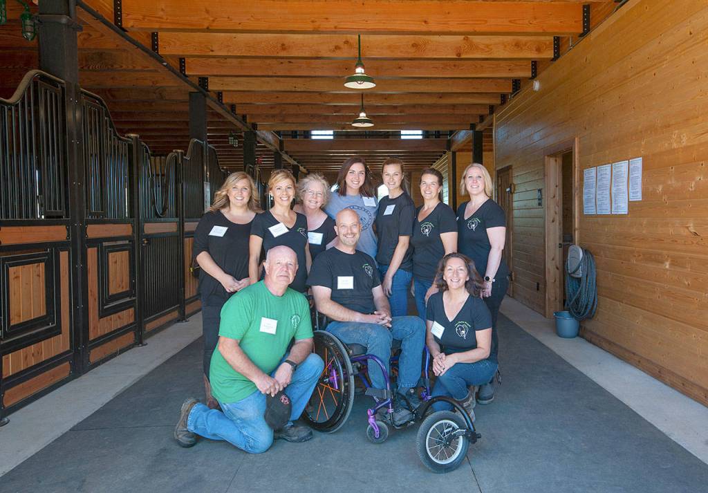 Photo courtesy Kristi Norberg                                Event organizers, from left, are (front row) Dave Miller, board president Jeff Miller and Wanda Wall, and (back row) Jenny LaDue, Georgia Bravos, Cathy Finney, Summit Pacific registered nurse Kim Iverson, Hailey Jones, Trisha Jones and Shelley Robinette.