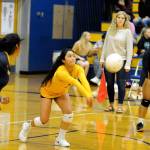 Aberdeen libero Julizza Ambrocio-Felipe, middle, receives a serve against Elma on Tuesday at Sam Benn Gym in Aberdeen. (Ryan Sparks | Grays Harbor News Group)