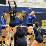 Elma outside hitter Quin Mikel (11) rises to record one of her game-high 16 kills in a straight-set victory over Aberdeen on Tuesday in Aberdeen. (Ryan Sparks | Grays Harbor News Group)
