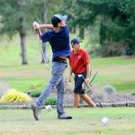 Hasani Grayson | Grays Harbor News Group Aberdeens Nolan King takes his tee shot on the 6th hole at Highlands Golf Course in a matchup against Hoquiam on Thursday. King was tied for the lowest score of the day, shooting a 42 in nine holes of golf.