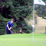 Aberdeens Evan Waara chips in towards the green from the edge of the rough on the 6th hole at Highlands Golf Course on Thursday. (Hasani Grayson | Grays Harbor News Group)