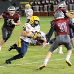 Aberdeens Ethan Morrill (20) runs for a first down in the second quarter against Hoquiam at Olympic Stadium on Friday. (Hasani Grayson | Grays Harbor News Group)