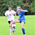 Elmas Jillian Bieker (12) protects the ball from Sheltons Mei Ping Vernon in the first half of a game at Davis Field in Elma on Saturday afternoon. (Hasani Grayson | Grays Harbor News Group)