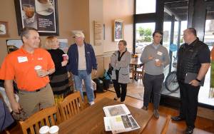 Photo by DAN HAMMOCK | GRAYS HARBOR NEWS GROUP                                Among the more than 40 people at a BHP meet-and-greet at the Jitter House in Hoquiam Wednesday morning were, from left, BHP Community Engagement Specialist Courage Bear; Hoquiam Mayor Jasmine Dickhoff; Port of Grays Harbor Commission President Stan Pinnick; Port of Grays Harbor Public Affairs Manager Kayla Dunlap; Public Affairs and Communications Director Austin Hicks; and Hoquiam City Councilman and mayoral candidate Ben Winkelman.