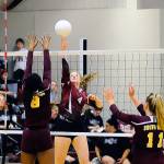 Ocostas Lillian Barnum (4) tips the ball over the net while South Bends Brittney Jones (8) defends in the first set of a match on Tuesday in South Bend. (Hasani Grayson | Grays Harbor News Group)
