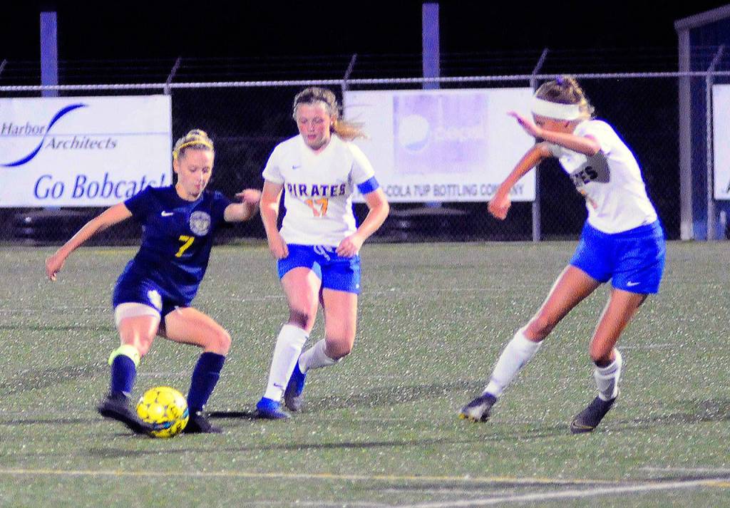 Aberdeens Emma Green protects the ball from Adnas Brynn Arrington (17) in the first half of a match on Thursday at Stewart Field. Green scored the only goal of the game off of penalty kick in Aberdeens 1-0 victory. (Hasani Grayson | Grays Harbor News Group)