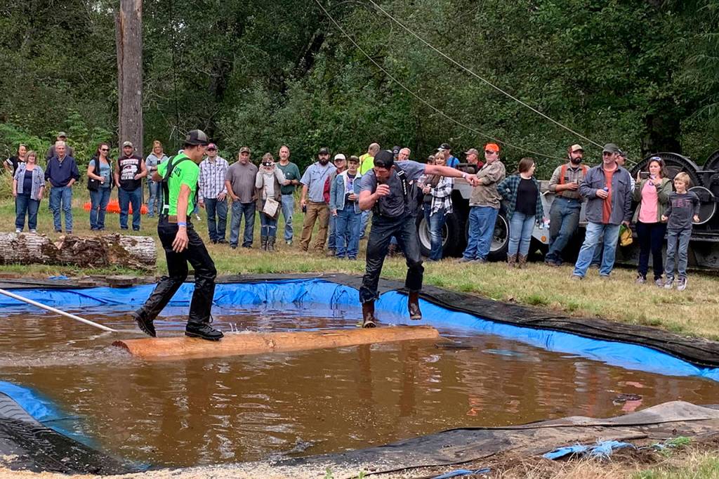 Kat Bryant | Grays Harbor News Group                                Nick Strachota, left, and Bradon Wharton vie for first place in log rolling.