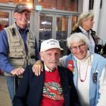 Photo courtesy OHagan family                                Family members Daniel OHagan, left, and Jenny Vinson greeted John OHagan, seated, after his Honor Flight.