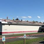 COURTESY OCOSTA SCHOOL DISTRICT                                The Ocosta School District is putting a new roof on the community gym. Construction began Sept. 16 and continued Monday.