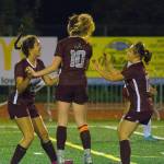 Montesanos Elleah Jones, left, celebrates with Brooke Streeter, middle, and Izabel Cope after scoring a goal in the 25th minute of the first half of a match against Hoquiam. (Hasani Grayson | Grays Harbor News Group)