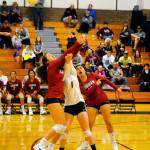 Hoquiams Maggie Mazariegos and Hailey Lawerence come together to dig out a shot in the fourth set of a match against Montesano. (Hasani Grayson | Grays Harbor News Group)