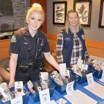 Starbucks donated several baskets for a silent auction to benefit the Aberdeen Police Officers Guild. Manning the table were Officer Brandi Zieber and records specialist Mandi Stump.