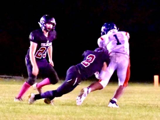 Ocostas Brandon Thomas (2) makes a tackle during Fridays win over Northwest Christian in Westport. (Submitted photo)