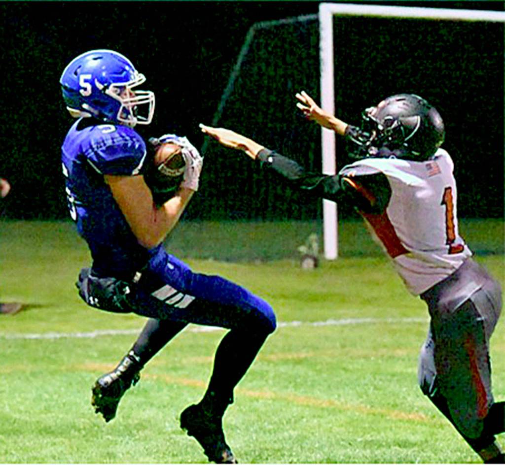 Elma receiver Tysen Richardson, left, hauls in a touchdown pass from quarterback Cody Vollan during the Eagles 62-7 victory over RA Long on Friday. (Photo by Sue Michalak Budsberg)