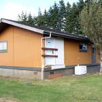 A side door to the Cosmopolis Police station is boarded up for safety and security reasons Tuesday, Oct. 8, 2019. (Michael Lang | Grays Harbor News Group)