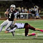 Montesano running back Aydan Darst runs toward the sideline as Hoquiams Cameron Bumstead makes the tackle during Montesanos 48-0 win on Friday at Jack Rottle Field. (Hasani Grayson | Grays Harbor News Group)
