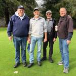 Bob Smith, second from left, is pictured with (from left) Doug King, Ed Coyle and Dave Scure after shooting an ace at Highland Golf Course on Tuesday. (Submitted photo)