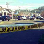Dave Haerle | Grays Harbor News Group                                Investigators arrive to process the scene of a midday officer-involved shooting in the 300 block of East Market Street in Aberdeen Thursday.