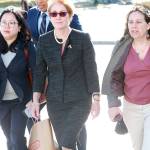Marie Yovanovitch, center, the former U.S. ambassador to Ukraine, arrives on Capitol Hill on Friday, Oct. 11, to testify in the impeachment inquiry against President Trump. (Kirk McKoy/Los Angeles Times)