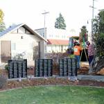 City of Montesano and Aberdeen Cemetery Association personnel add a fourth marble monument to the Marion J. Bogey Bogdanovich Veterans Honor Wall on Thursday, Oct. 31, 2019, at Fleet Park in Montesano. (Michael Lang | Grays Harbor News Group)