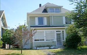 COURTESY PHOTO                                Methamphetamine and heroin were seized when a search warrant was executed on this house in the 200 block of West Third Street in Aberdeen shorty after midnight Tuesday by the Grays Harbor Drug Task Force. The home is across the street from McDermoth Elementary School.