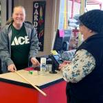 Kat Bryant | Grays Harbor News Group                                Store manager Kellie Nordberg, left, shares a laugh with one of her customers Friday. Ive watched her grandkids grow up! she said emotionally after the customer left.