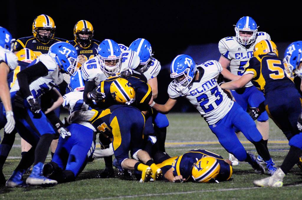 Elma defensive end Jesus Torres (45) makes a tackle during a game against Aberdeen on Sept. 20. (Ryan Sparks | Grays Harbor News Group)